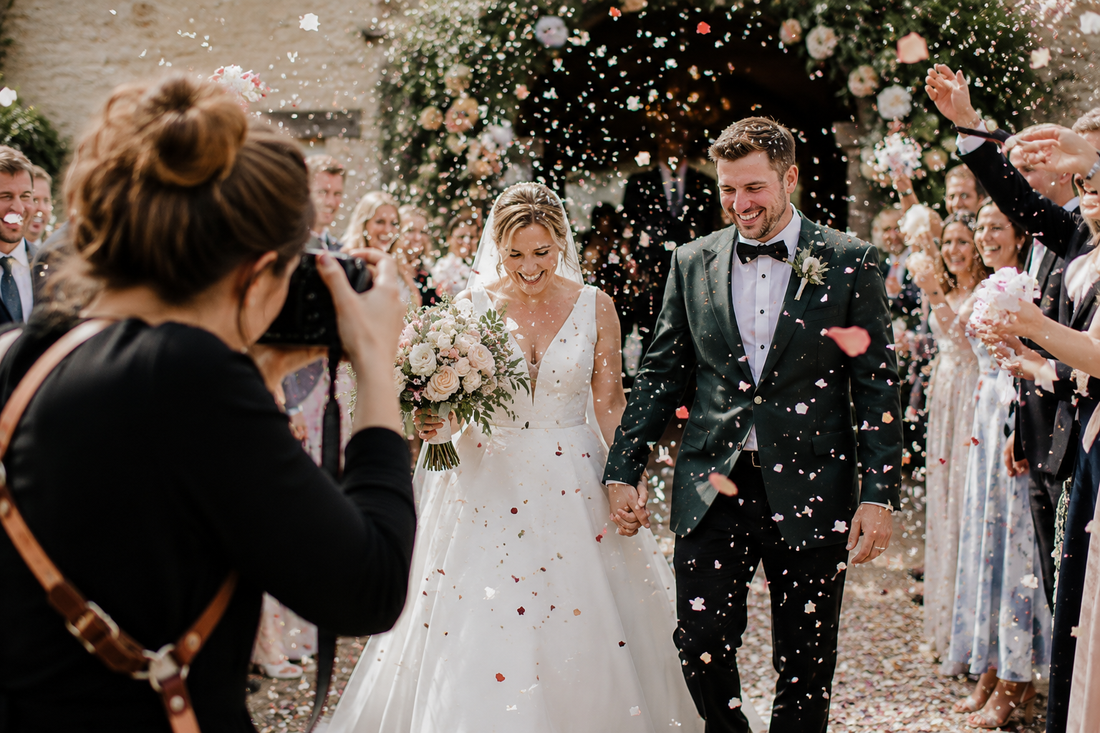 Photographer capturing a confetti toss