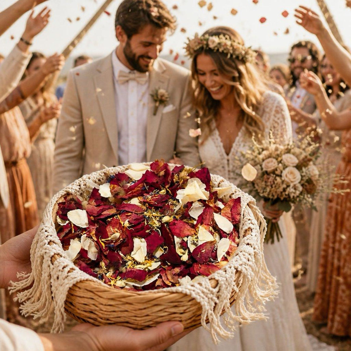 Wicker basket filled with dried flower confetti beside a wedding couple in the background